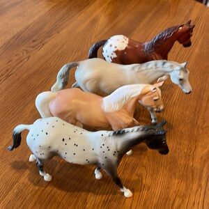 Lot of 4 used Breyer horses